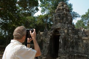 Man Photographing Ancient Temple